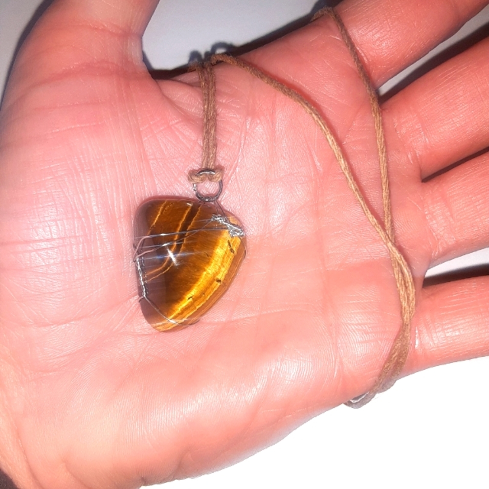 Polished tigers eye with hemp cord